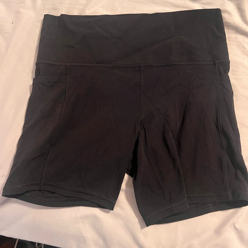 Athleta Salutation Stash pocket 5” size large